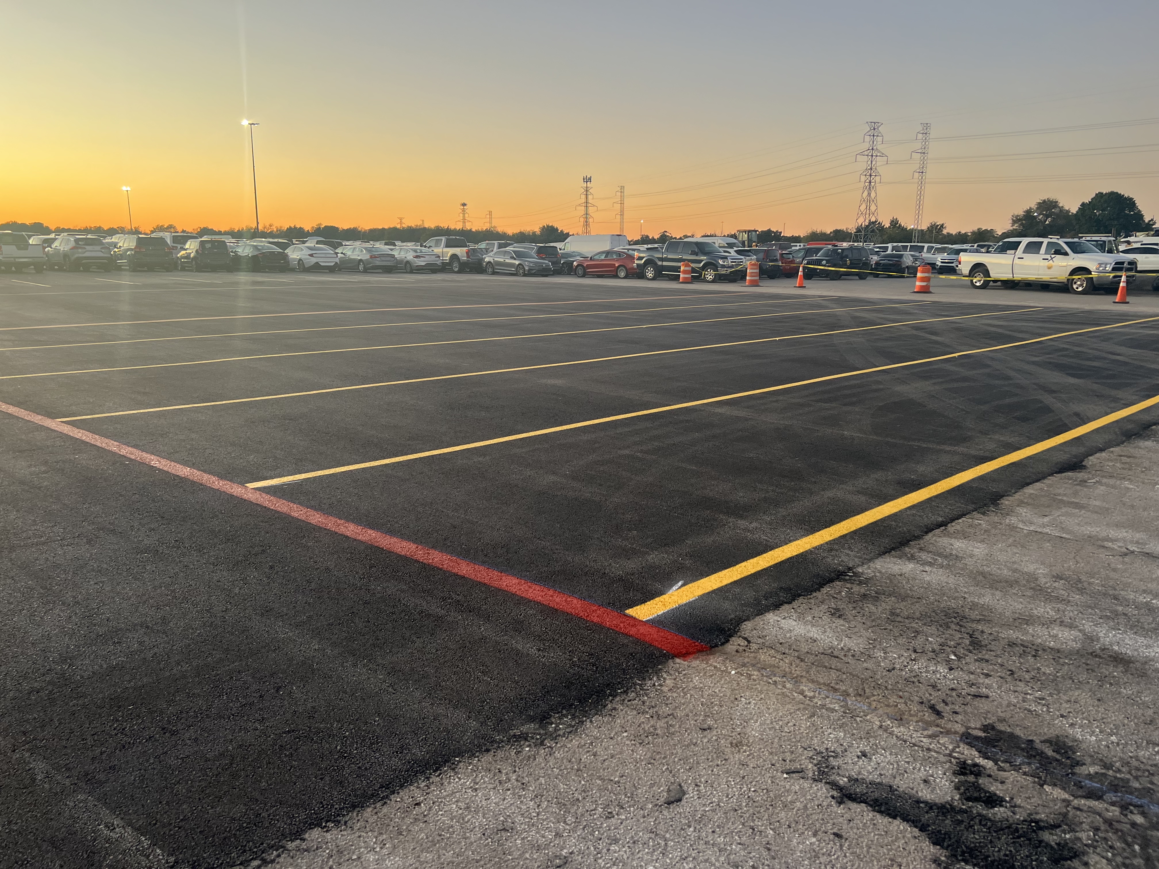 Pavement lot with workers